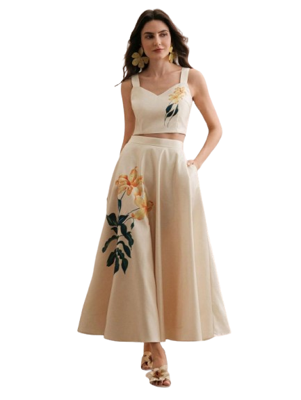 Man wearing brown shirt and beige trousers in formal casual style.